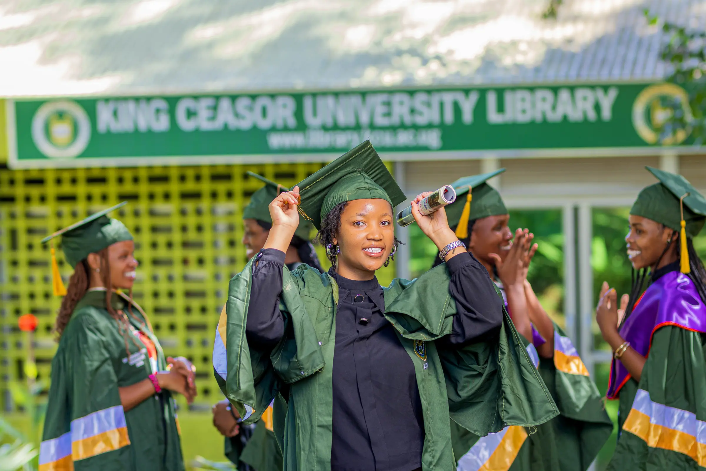 King Ceasor University graduands celebrating on campus